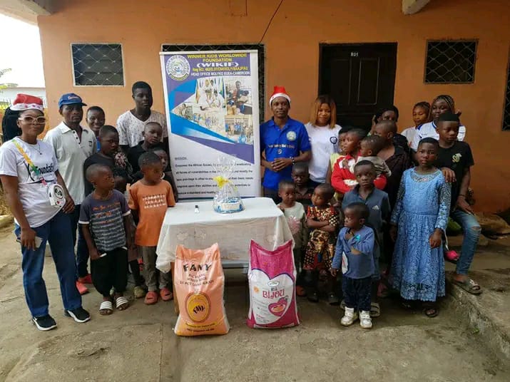 WIKIF distributing food aid to families in need